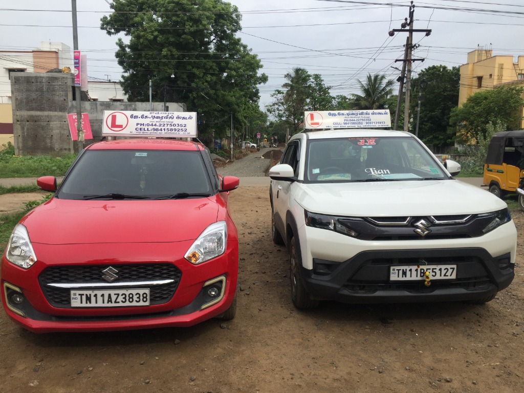 JK Driving School Dual-Control Fleet - Red Swift and White Brezza
